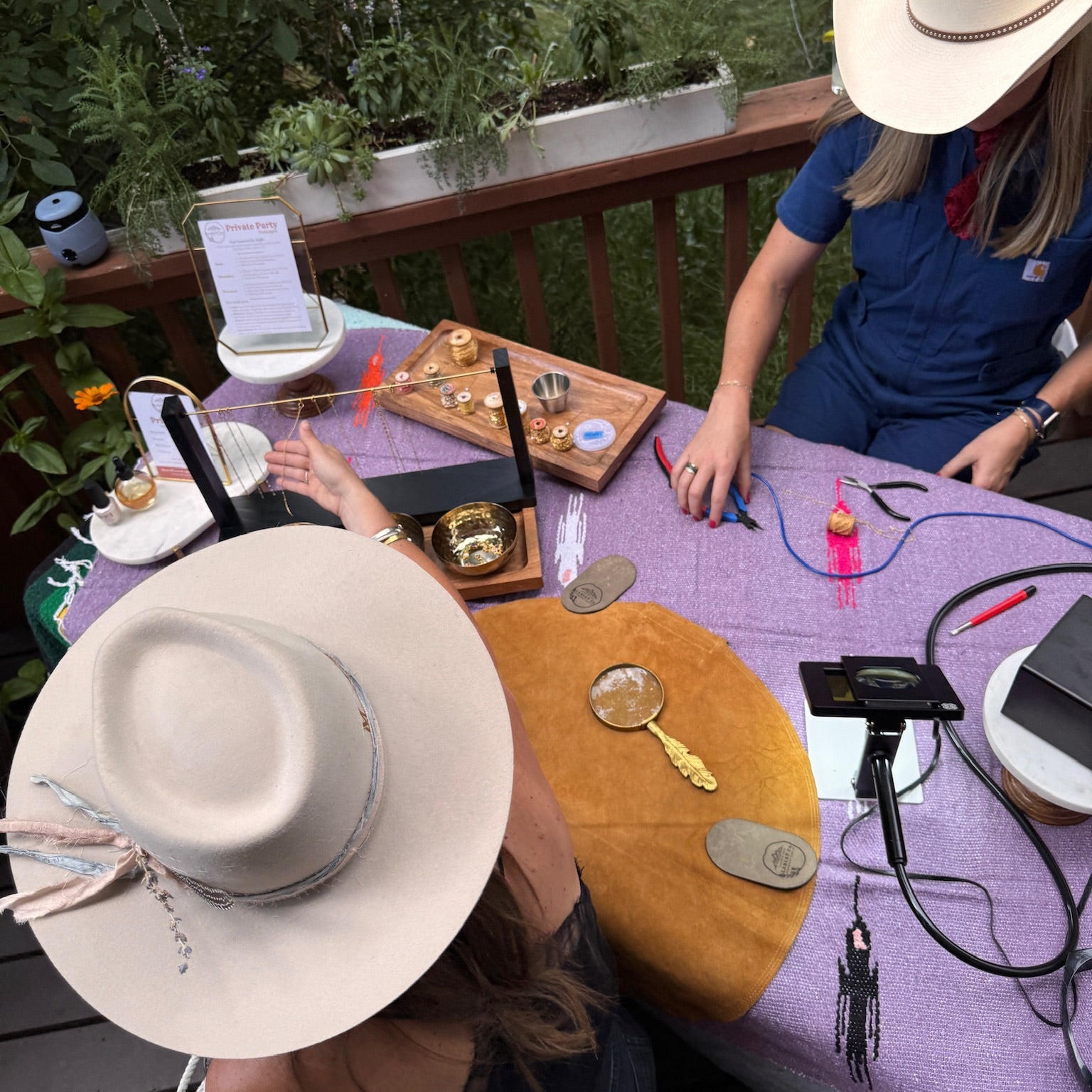 woman selecting a permanent jewelry chain. 